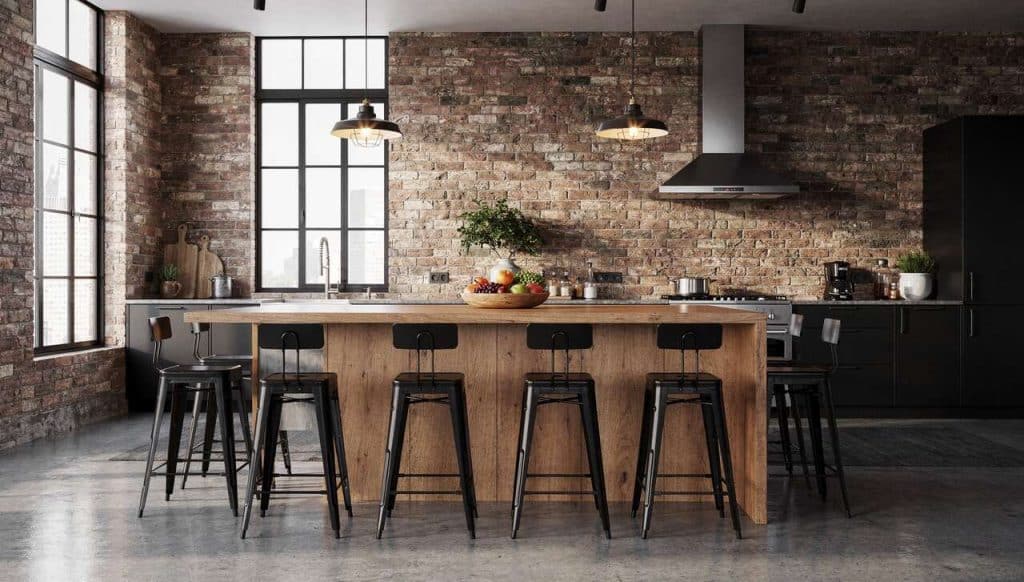 Îlot central, tabourets, métal noir : les bons choix pour une cuisine atelier